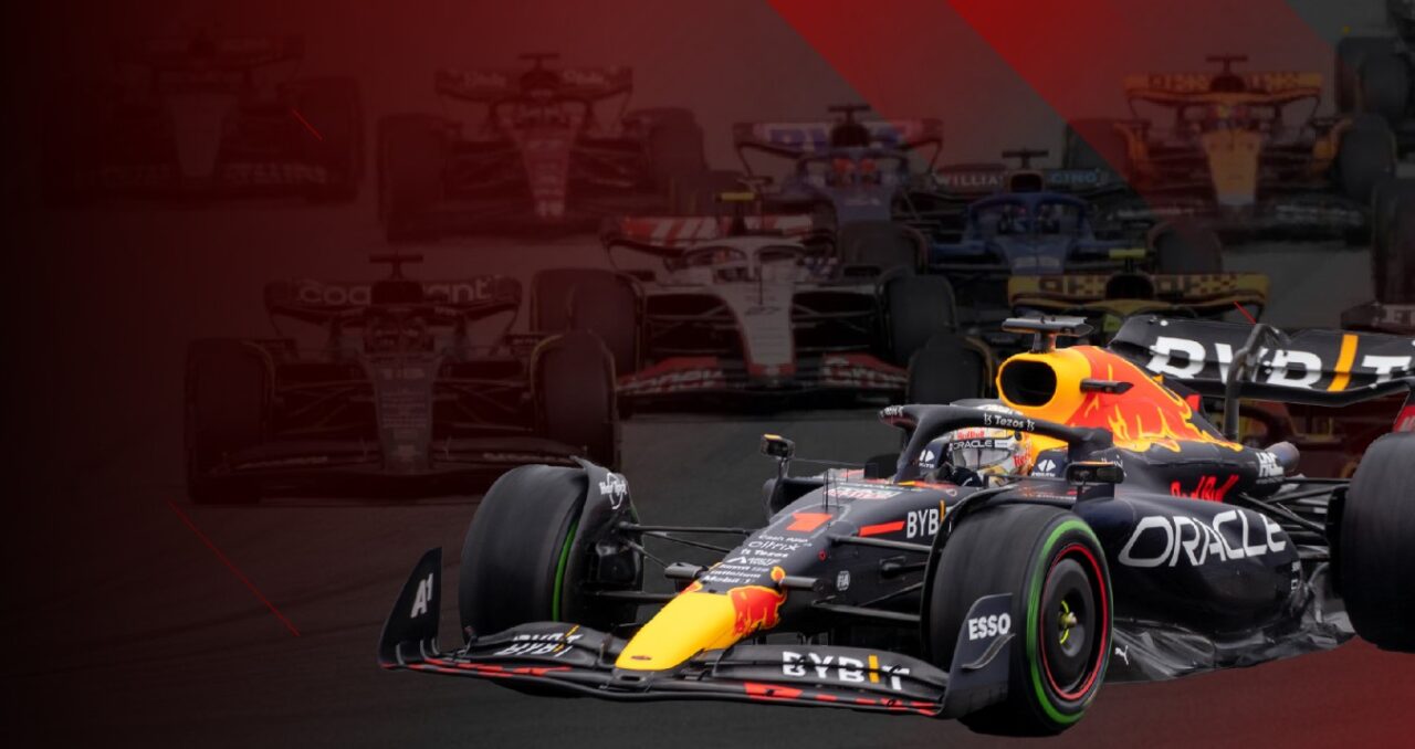 Formula 1 Red Bull Racing car on track side view with blurred background
